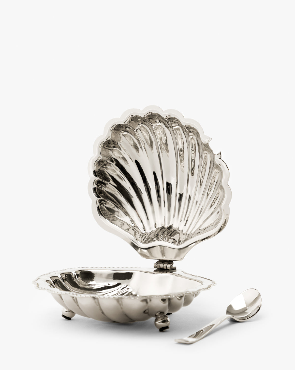 Plat de service en coquillage avec cuillère