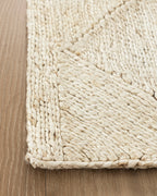 Tapis en jute blanchi tressé en losanges