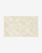 Tapis en jute blanchi tressé en losanges