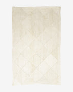 Tapis en jute blanchi tressé en losanges