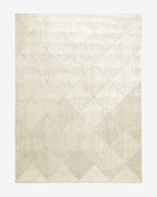 Tapis en jute blanchi tressé en losanges