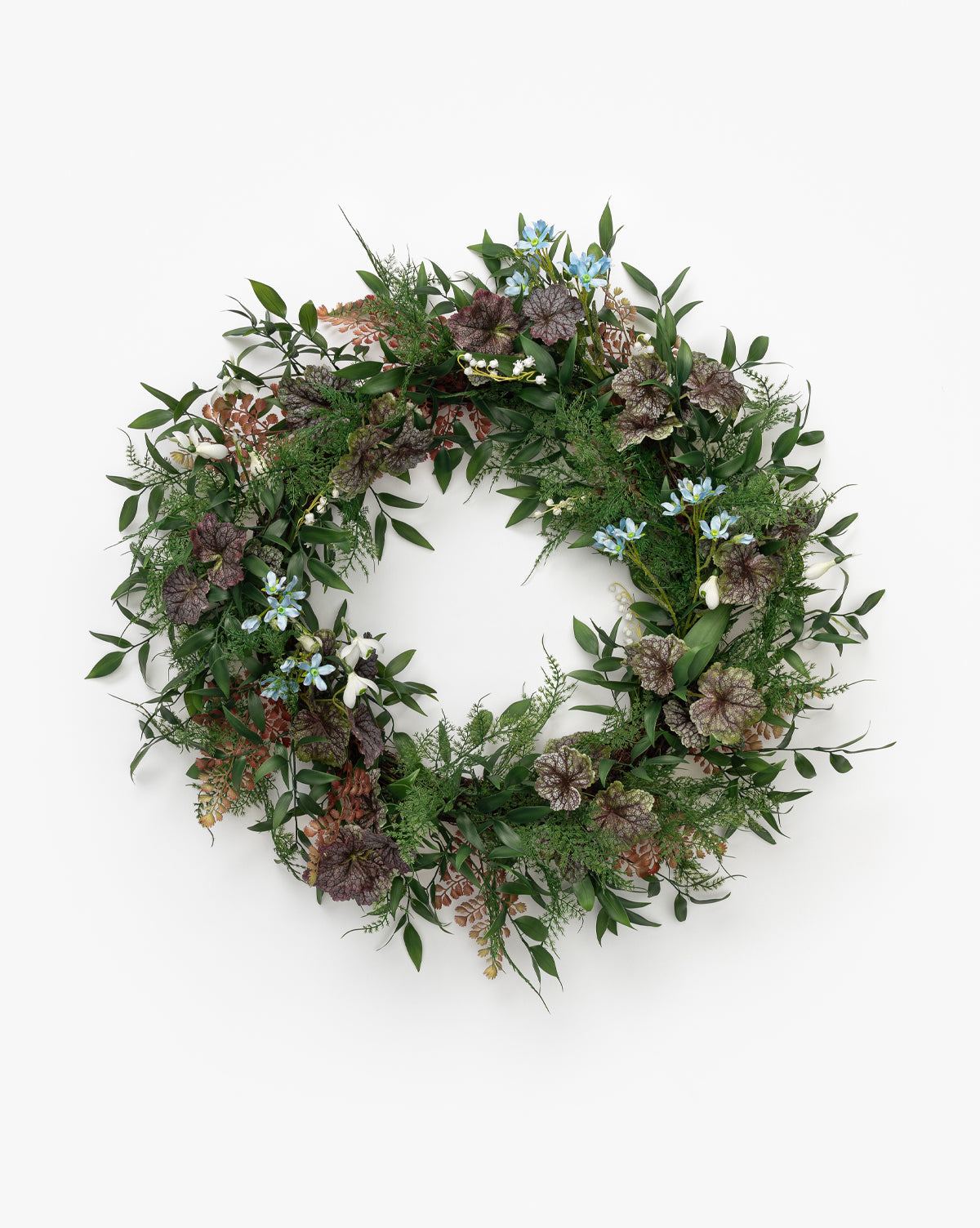 Couronne de fougères artificielles et de bégonias