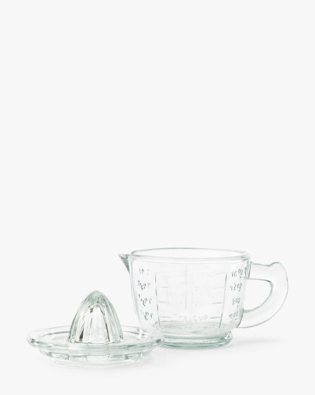 Presse-agrumes en verre avec verre doseur