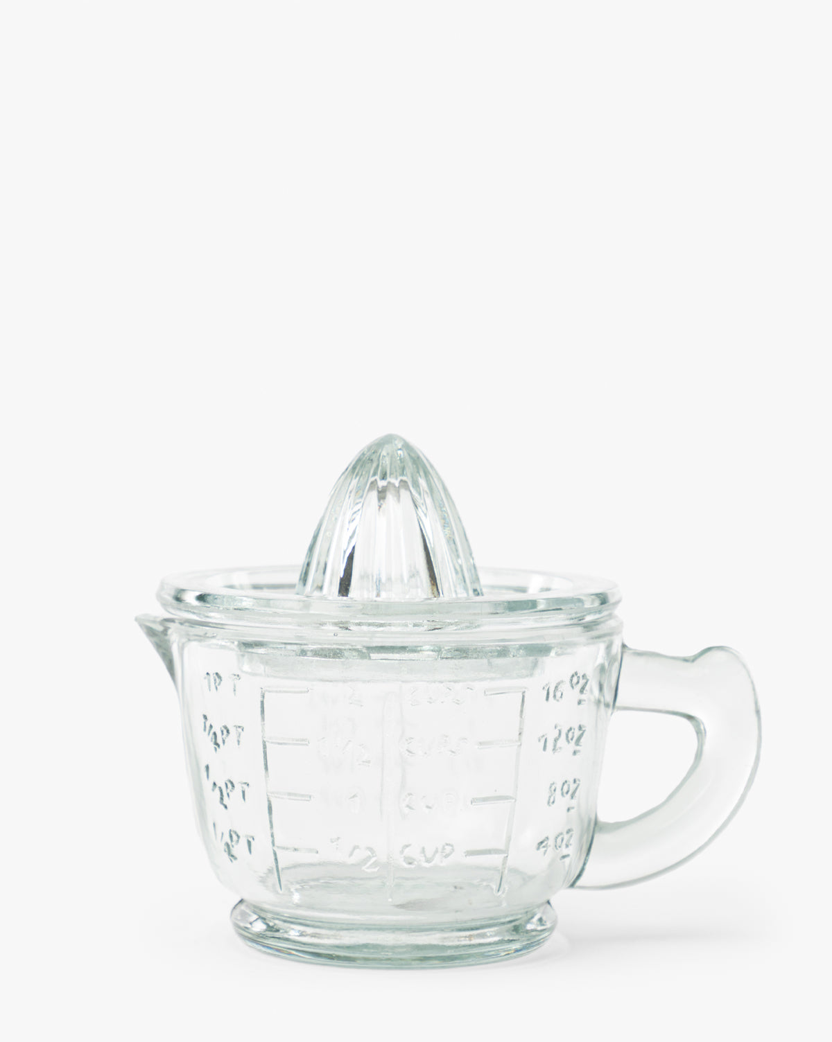 Presse-agrumes en verre avec verre doseur